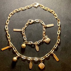 .925 Silver charm bracelet and necklace set by Tiffany and Co.